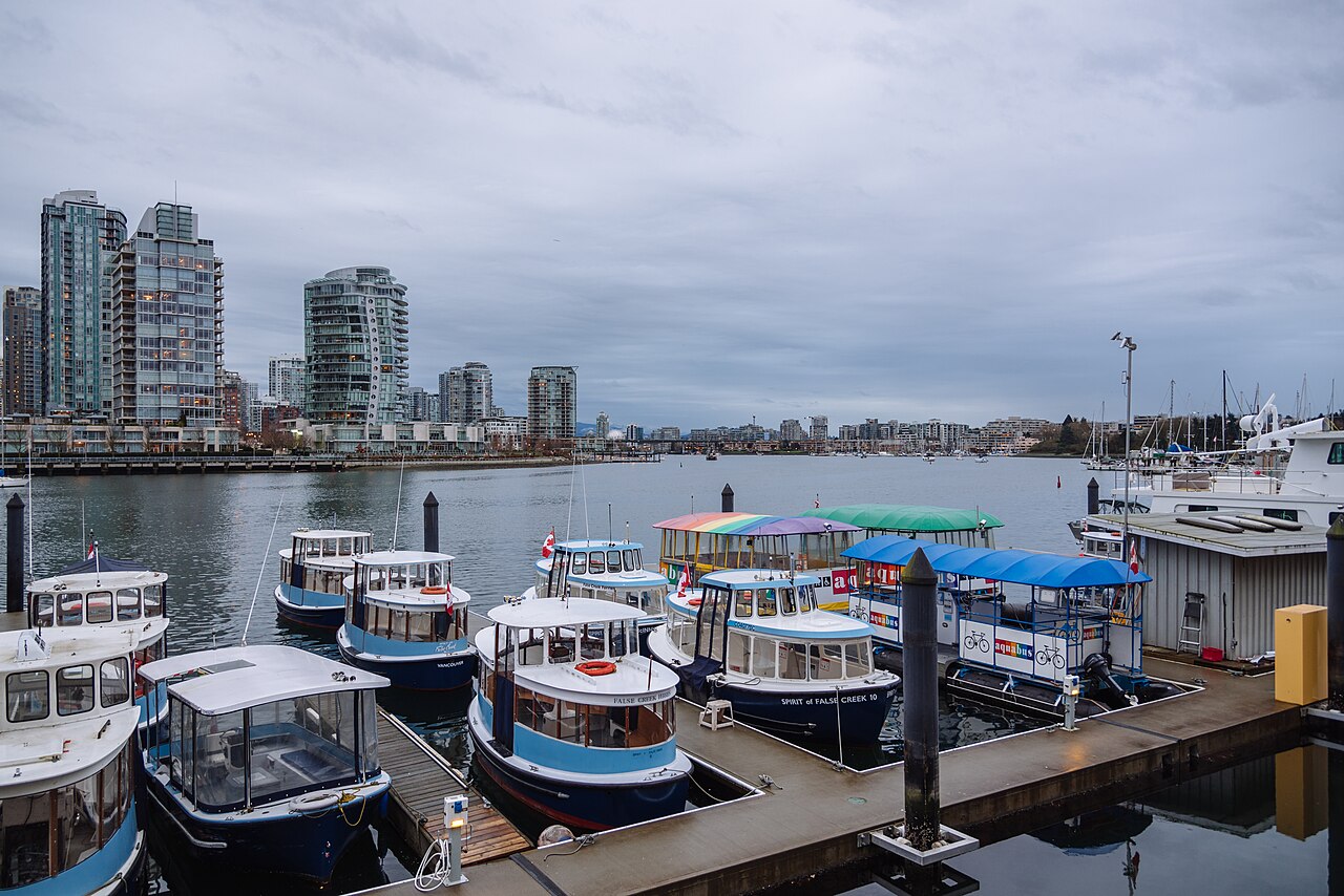 False Creek ferry dock with Vancouver waterfront towers beyond