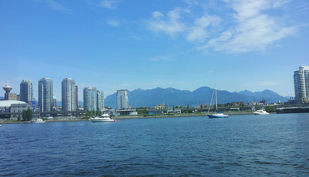 Vancouver waterfront towers and boats across Coal Harbour